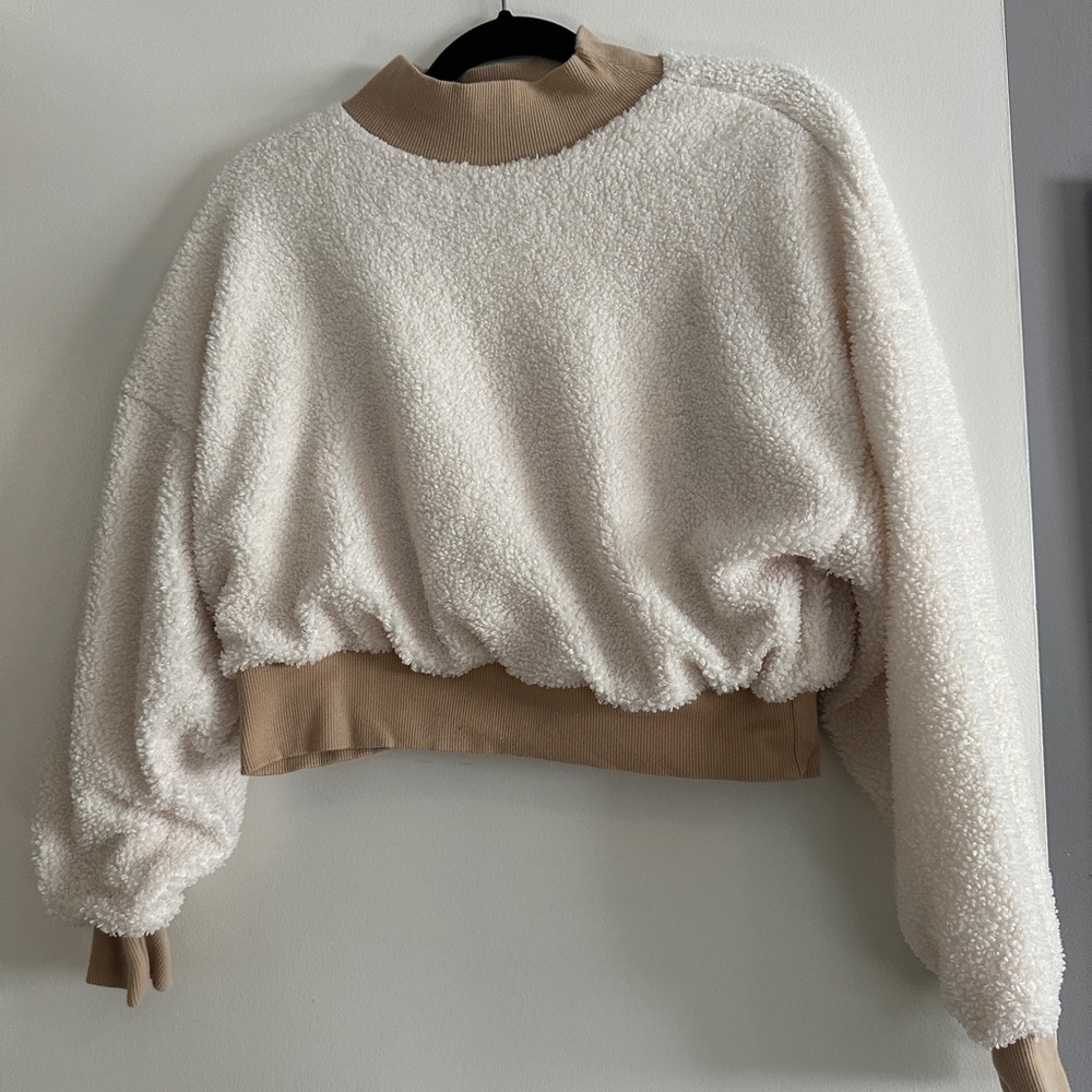 Cream and tan cropped fabletics sweater